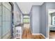Inviting foyer with hardwood floors, neutral wall colors, console table, and bright natural light at 519 Tarleton Dr, Summerville, SC 29483