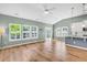 Bright living room with modern finishes, large windows, and view of kitchen and backyard at 519 Tarleton Dr, Summerville, SC 29483