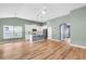 Open floor plan features a living room with hardwood floors and a kitchen with island at 519 Tarleton Dr, Summerville, SC 29483