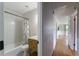 Bathroom featuring subway tiles, wooden vanity, and black and white mosaic floors at 7 Plainfield Dr, Charleston, SC 29407