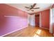 Cozy bedroom with hardwood floors, ceiling fan, closet and natural light at 7 Plainfield Dr, Charleston, SC 29407