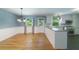 Open-concept kitchen with stainless steel appliances, granite countertops, and stylish pendant lighting at 7 Plainfield Dr, Charleston, SC 29407
