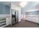 Bright kitchen boasting stainless steel appliances, white cabinets, and granite countertops for ample workspace at 7 Plainfield Dr, Charleston, SC 29407