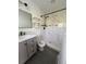 Modern bathroom with tiled shower featuring rainfall showerhead at 702 N N Palmetto St, Summerville, SC 29483