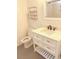 Well-lit bathroom featuring a new vanity with quartz countertops at 702 N N Palmetto St, Summerville, SC 29483