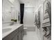 Stylish bathroom features double sinks, modern fixtures, and a shower-tub combo at 727 Breakers Reef Ln, Huger, SC 29450