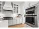 Well-equipped kitchen features stainless steel appliances and ample counter space at 727 Breakers Reef Ln, Huger, SC 29450