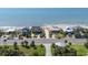 Beautiful beach view featuring beachfront houses, sandy shoreline, and the vast ocean at 817 Cheehaw St, Edisto Island, SC 29438