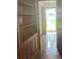 Hallway with built-in shelving and an exterior view through the front door at 874 Evans Rd, Charleston, SC 29412