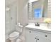 Modern bathroom featuring a glass shower, toilet, vanity with dark pulls, and neutral decor at 93 Ashley Hall Plantation Rd # 6, Charleston, SC 29407