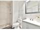 Bathroom featuring a glass shower, toilet, vanity with dark pulls, and neutral decor at 93 Ashley Hall Plantation Rd # 6, Charleston, SC 29407