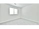 Bright bedroom featuring plush carpeting, and a sunlit window with a blind at 93 Ashley Hall Plantation Rd # 6, Charleston, SC 29407