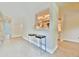 Chic breakfast bar with modern stools, offering an open view of the kitchen at 93 Ashley Hall Plantation Rd # 6, Charleston, SC 29407