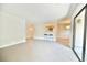 Open concept living room with breakfast bar and sliding glass doors at 93 Ashley Hall Plantation Rd # 6, Charleston, SC 29407