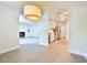 Open-concept space featuring a living area with a fireplace and a modern kitchen with stainless steel appliances at 93 Ashley Hall Plantation Rd # 6, Charleston, SC 29407