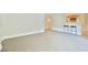 Open living room area with breakfast bar and modern stool seating at 93 Ashley Hall Plantation Rd # 6, Charleston, SC 29407