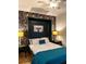 Unique bedroom featuring a Murphy bed and eye-catching floral wallpaper at 10 Riker St, Charleston, SC 29403