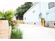 View of the home's driveway and side yard, showcasing the well-maintained exterior at 10 Riker St, Charleston, SC 29403