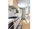 Spacious kitchen with professional grade appliances and a large island at 10 Riker St, Charleston, SC 29403