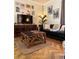 Comfortable living room featuring a leather sofa, wooden coffee table, and stylish decor at 10 Riker St, Charleston, SC 29403