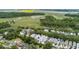 Aerial view of neighborhood featuring a marsh with river access near Charles Towne Landing at 1052 Avenue Of Oaks, Charleston, SC 29407