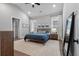 Stylish bedroom with neutral walls, recessed lighting, and large windows that let in lots of natural light at 1052 Avenue Of Oaks, Charleston, SC 29407