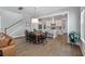Spacious open-concept kitchen with a large island, stainless steel appliances, and stylish dining area at 1052 Avenue Of Oaks, Charleston, SC 29407