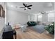 Open-concept living room featuring neutral paint, wood floors, and modern furnishings at 1052 Avenue Of Oaks, Charleston, SC 29407