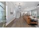 Spacious living room featuring hardwood floors and an open floor plan to the kitchen at 1052 Avenue Of Oaks, Charleston, SC 29407