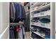 Walk-in closet featuring hanging rods, shelving, and folded clothing at 1052 Avenue Of Oaks, Charleston, SC 29407
