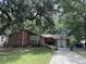Charming single-story brick home featuring a two-car garage, a driveway, and a well-manicured front yard at 1056 Yorktown Dr, Charleston, SC 29412
