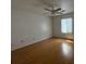 Bedroom featuring wood floors, a window, and ceiling fan at 106 Teddy Ct, Summerville, SC 29485