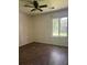 Bedroom featuring wood floors, a window, and ceiling fan at 106 Teddy Ct, Summerville, SC 29485
