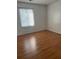 Bedroom with hardwood floors and a window providing natural light at 106 Teddy Ct, Summerville, SC 29485