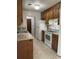 Kitchen with wooden cabinets, tile flooring, and stainless steel appliances at 106 Teddy Ct, Summerville, SC 29485