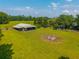 Spacious grounds featuring outbuilding, and lush pasture with fenced grazing area at 1133 Highway 311, Cross, SC 29436