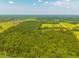Stunning aerial perspective of lush greenery, expansive forests, and natural landscapes at 1133 Highway 311, Cross, SC 29436