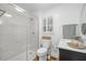 Bathroom with marble countertop, glass enclosed shower, and modern fixtures at 1133 Highway 311, Cross, SC 29436