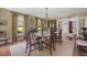 Elegant dining room with hardwood floors, chandelier, and a hutch at 1133 Highway 311, Cross, SC 29436