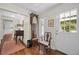Welcoming foyer featuring a grandfather clock, a beautiful patterned rug and an exterior door at 1133 Highway 311, Cross, SC 29436