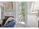 Bright living room with fireplace, shutters, and natural light at 1133 Highway 311, Cross, SC 29436