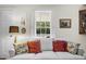 Comfortable living room with white sofa, shutters, and decor at 1133 Highway 311, Cross, SC 29436