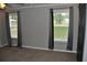 Bedroom with modern curtains and large windows offers a relaxing space at 123 Christina Ln, Summerville, SC 29483