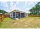 Large, well-maintained backyard with a fenced-in yard, perfect for outdoor activities and pets at 1250 Hammrick Ln, Johns Island, SC 29455