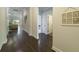 Inviting hallway with hardwood floors and elegant decor leading to living spaces at 1250 Hammrick Ln, Johns Island, SC 29455
