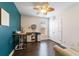 Home office boasts hardwood flooring, a modern color palette, and an abundance of natural light at 1250 Hammrick Ln, Johns Island, SC 29455