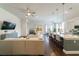 Open-concept living room seamlessly connects to a well-equipped kitchen with modern finishes at 1250 Hammrick Ln, Johns Island, SC 29455