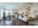 Open concept living space with a kitchen, dining area, and living room provides ample space for Gathering gatherings at 1250 Hammrick Ln, Johns Island, SC 29455