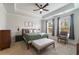 Spacious main bedroom with tray ceiling, plush carpet, and light filled windows at 1250 Hammrick Ln, Johns Island, SC 29455