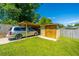 A spacious backyard offers parking and storage with a shed and covered parking area at 127 Rahway Rd, Goose Creek, SC 29445